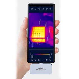 Thorair thermal imaging device displaying a heat map on a smartphone held in hand